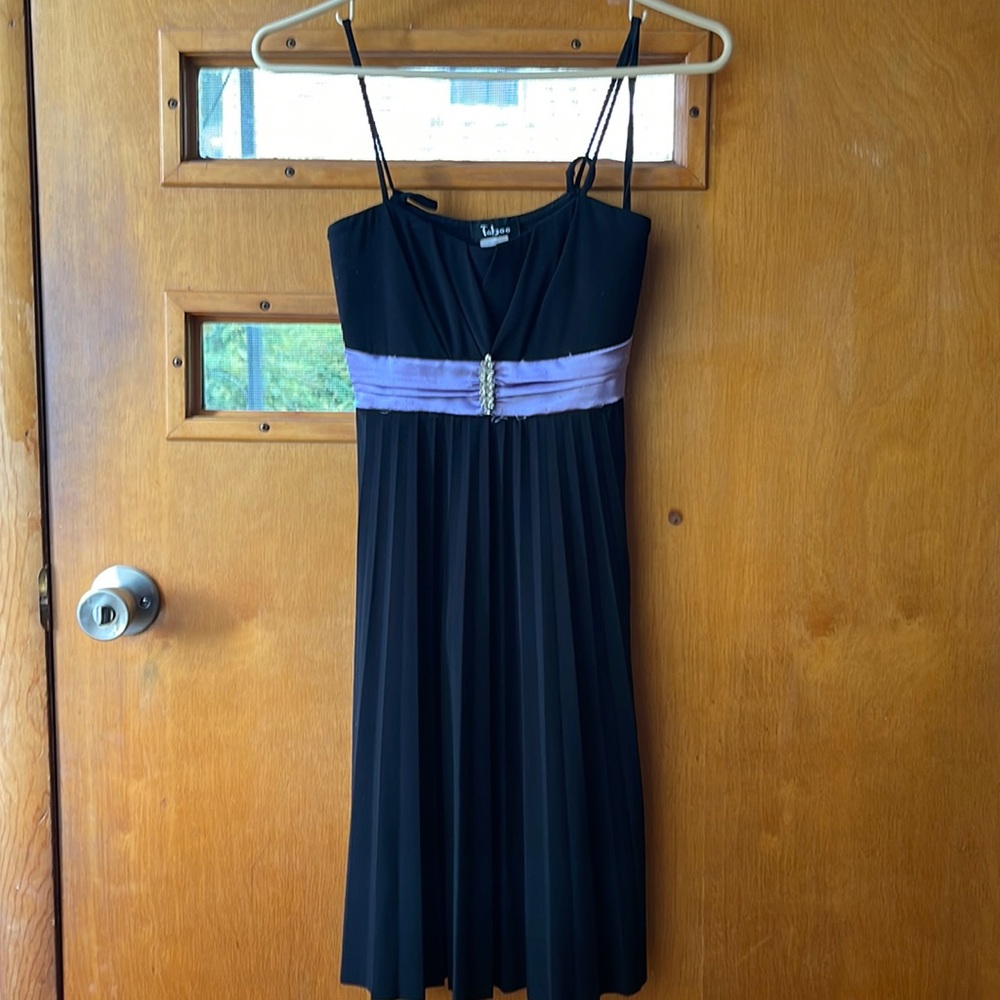 Black dress with purple ribbon for sale!